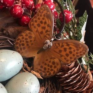 Sterling Silver Resin encased Butterfly Wings Pendant with Leather Cord.